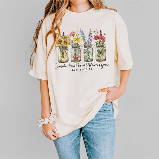 Wildflowers Christian Shirt, Luke 12:27-28 Bible Verse Tee, Faith-Based Floral Graphic Shirt, Inspirational Religious Outfit for Women
